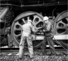 Grease Gunning No 2 1991, inserting grease plugs into the grease gun, Gelatin silver print